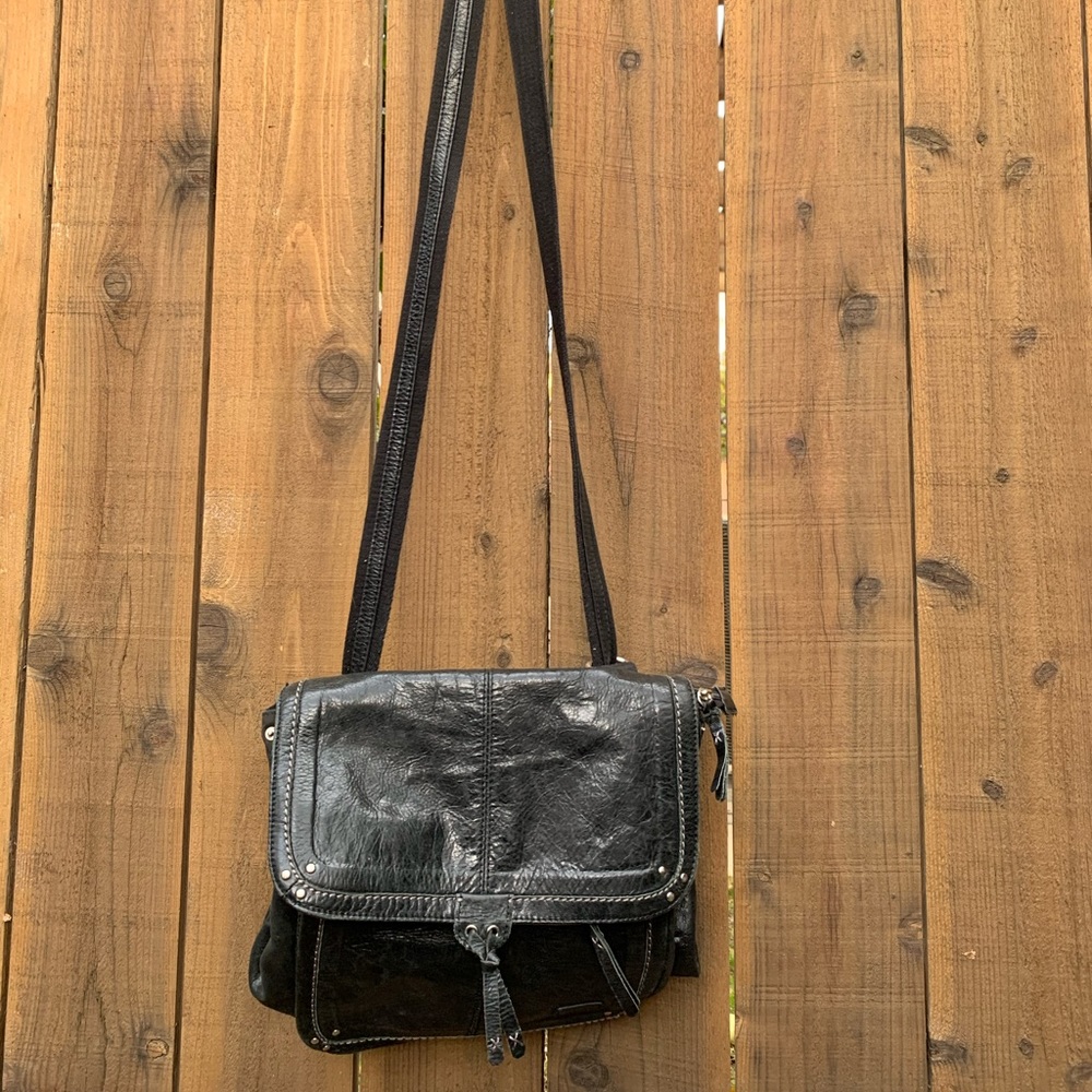 The SAK bohemian black leather crossbody backpack